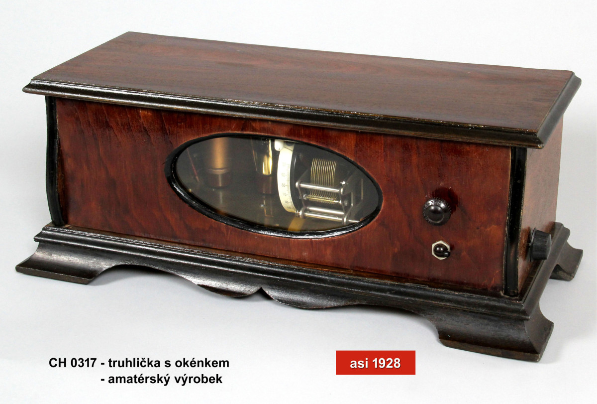 Box-style radio with glass window